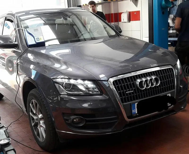 Lucrare la motor în atelierul TBG